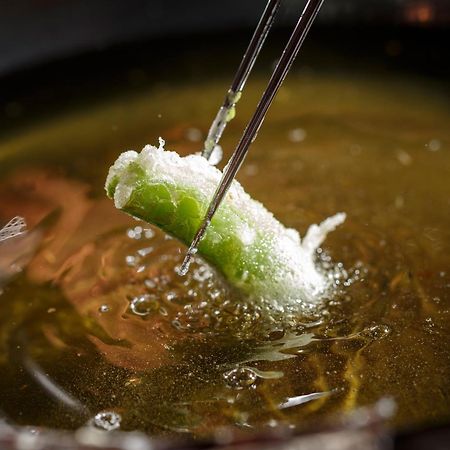 Hotel The Celestine Kyoto Gion Ngoại thất bức ảnh A spring roll being dipped in hot oil